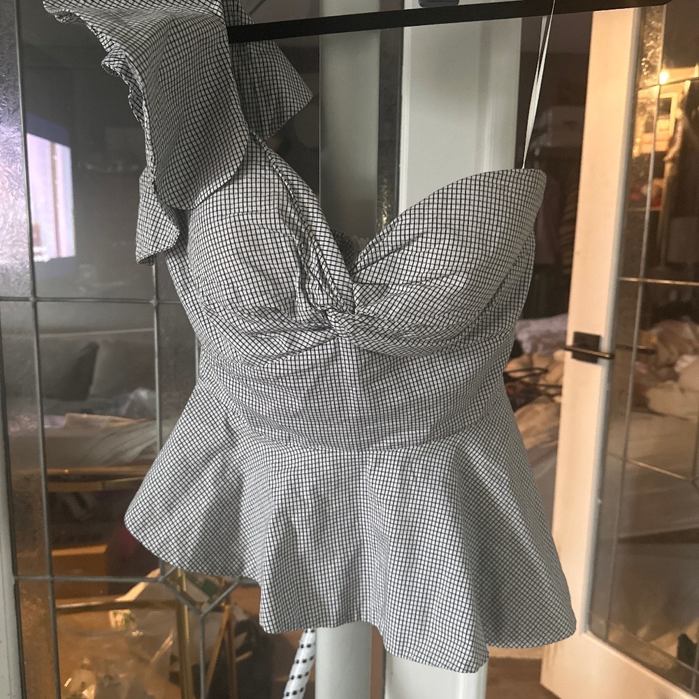 Lucy Paris asymmetrical one shoulder peplum tip